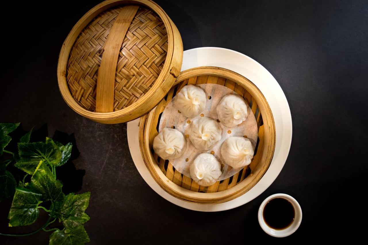 Art Series - The Chen Box Hill Exterior photo A steamer with dim sum